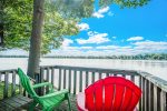 Relax in the shade on the tiered decking leading to the water